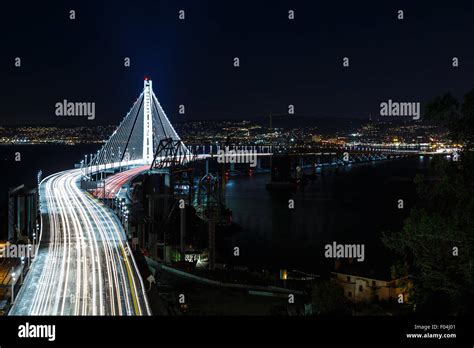 New span of the San Francisco-Oakland Bay Bridge illuminated at night Stock Photo - Alamy