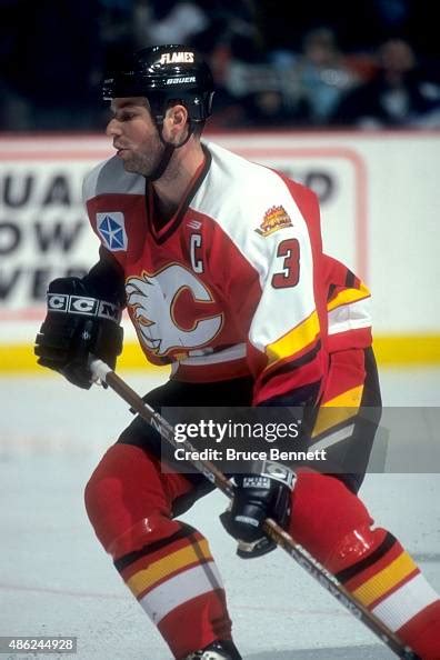 Eric Charron of the Saint John Flames skates on the ice during an AHL ...