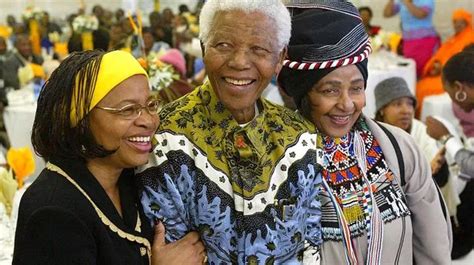 'Winnie Mandela was like a sister to her former husband Nelson's new wife as he lay dying ...