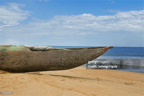 Handcarved Dugout Canoe With Fishing Net On Robertsport Beach In ...