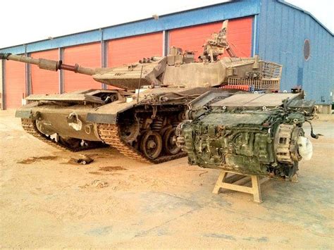 Merkava Mk 4 with dismounted engine. Also part of modular armor on ...