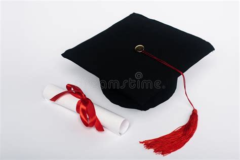 Black Graduation Cap with Red Tassel Stock Photo - Image of ribbon, degree: 173373328