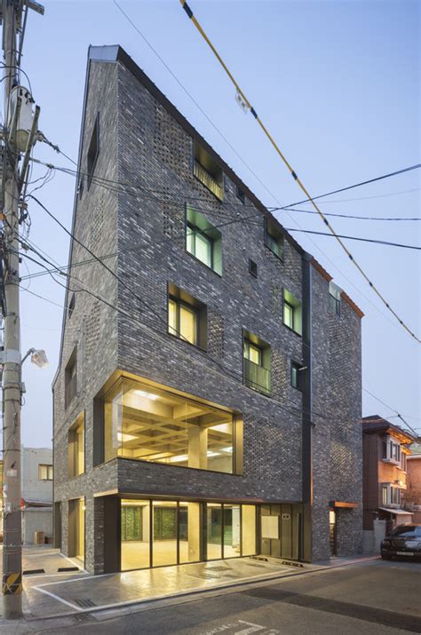 Old brick house / AtelierJun | ArchDaily