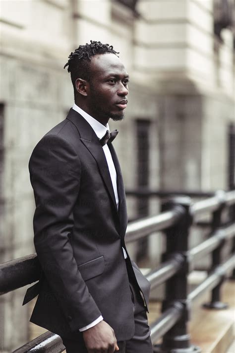 "Portrait Of An African American Business Man In A Black Suit And Bow Tie" by Stocksy ...