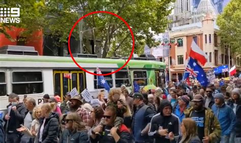 Disturbing detail in Melbourne protest photo as thousands gather