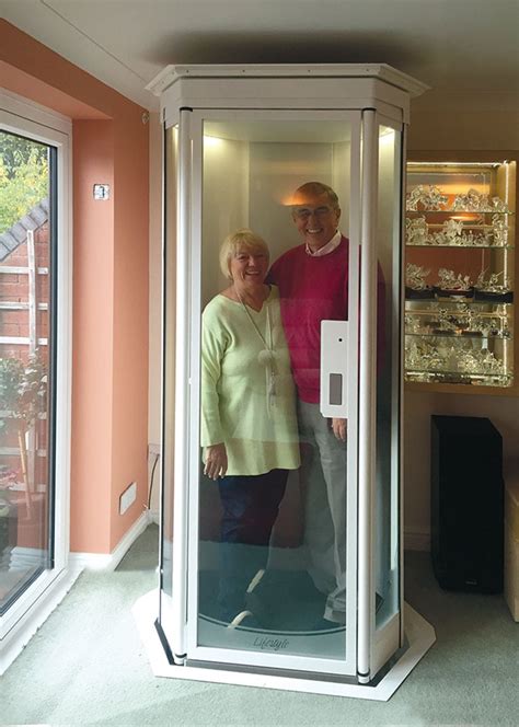 Mr-and-Mrs-Head-Elderly-Couple-Smiling-Using-Lifestyle-Home-Lift