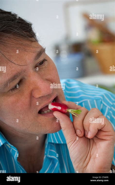 MAN EATING SALAD Stock Photo - Alamy