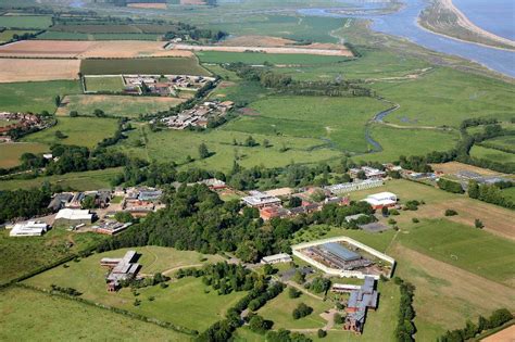 Covid-19: Open prison Hollesley Bay has 'quarter of inmates' infected - BBC News