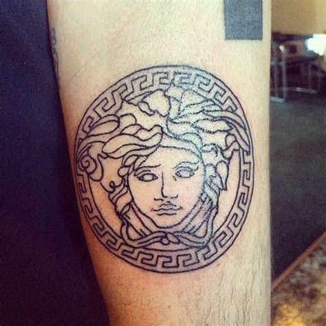 Can You ID the Logos in These Fashion Tattoos? | Versace tattoo, Tattoos, Tattoo styles