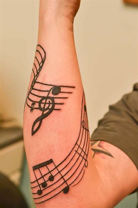 Image result for sheet music tattoo sleeve | Tatuajes musicales para ...