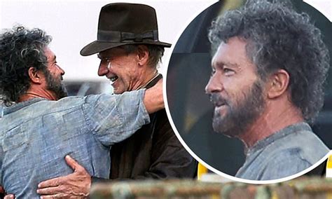 Harrison Ford greets Antonio Banderas with a bear hug on the seaside Sicily set of Indiana Jones 5