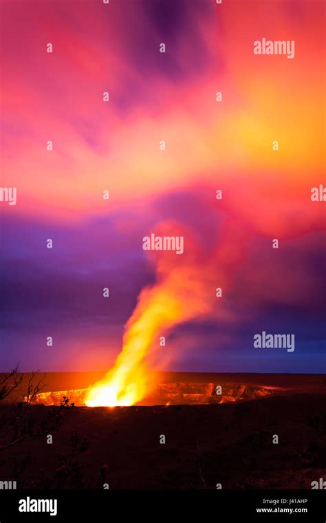 Kilauea's agitated lava lake vents into the night sky in Hawaii ...