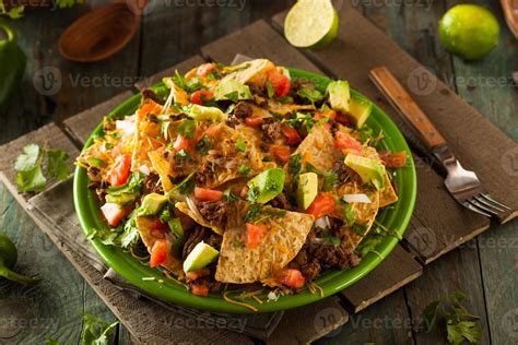 Loaded Beef and Cheese Nachos 703868 Stock Photo at Vecteezy