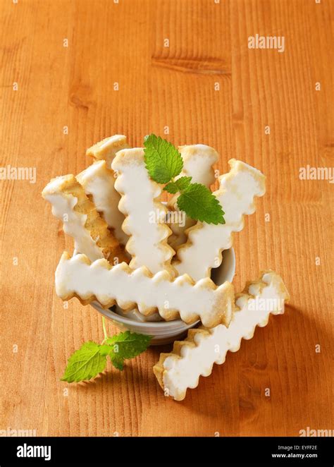 Vanilla cookies with white icing Stock Photo - Alamy