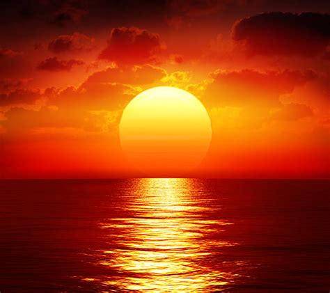 Best Big Sunset Over Sea Stock Photos, Pictures & Royalty-Free Images - iStock