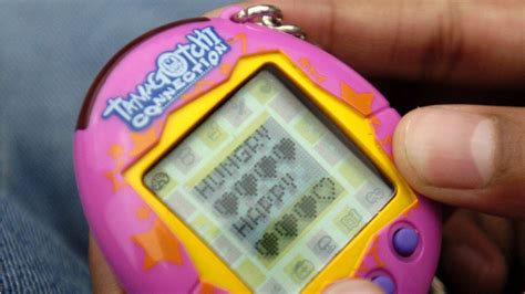 Iconic '90s Tamagotchi virtual toy makes comeback - YouTube