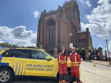 North West Air Ambulance Charity duo abseil 150ft down Liverpool ...