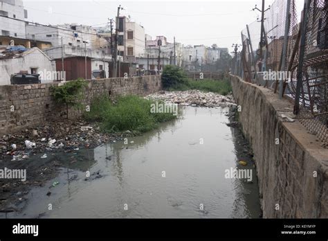 HYDERABAD, INDIA - OCTOBER 22,2017 Sewage canal clogged by floating ...