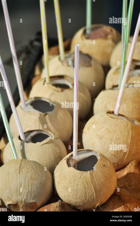 Bangkok (Thailand): coconut water sold along Sukhumvit Road Stock Photo - Alamy