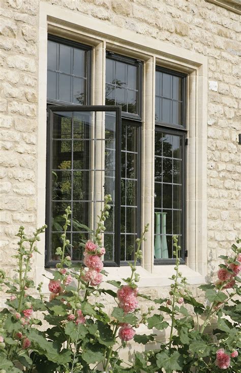 Advanced Bronze Casements Fitted Into Stone Mullions | Window trim exterior, Windows exterior ...