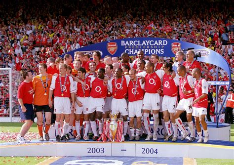 Stuart MacFarlane The Arsenal Invincibles The Arsenal squad celebrate winning the Premiership ...