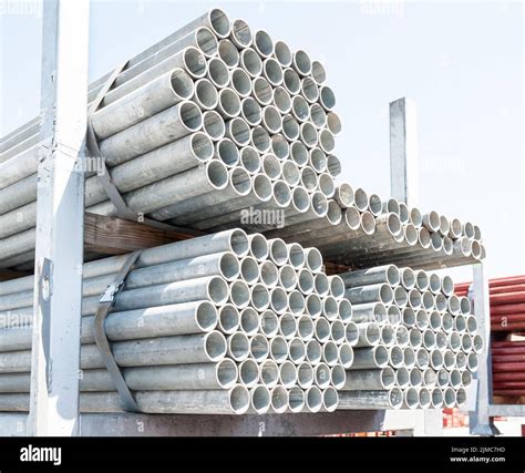 Stack of steel pipes for scaffolding in stock Stock Photo - Alamy