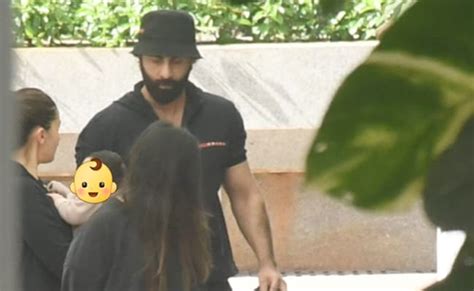 Pics: Alia Bhatt, Ranbir Kapoor Step Out With Daughter Raha For A Walk