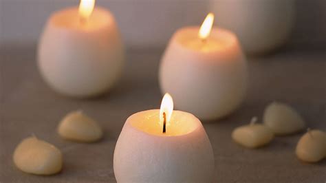 Download Three White Candles Wallpaper | Wallpapers.com