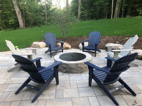Gorgeous Adirondack Chairs Around FirePit Truax Outdoor Living Seashell Adirondack Chairs in ...