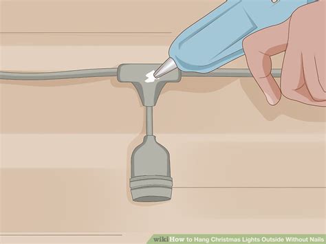 3 Ways to Hang Christmas Lights Outside Without Nails - wikiHow