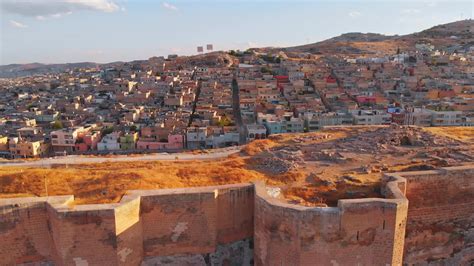 Aerial panning view ancient urfa castle walls in historical city of Sanliurfa. Turkey famous ...