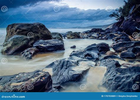 Rainbow Beach at sunrise stock image. Image of scenic - 170703889