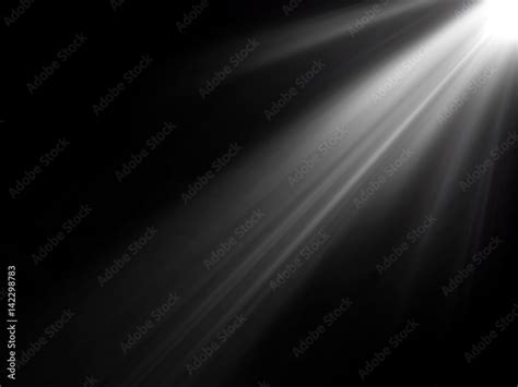 abstract beautiful rays of light on black background. Stock 写真 | Adobe Stock