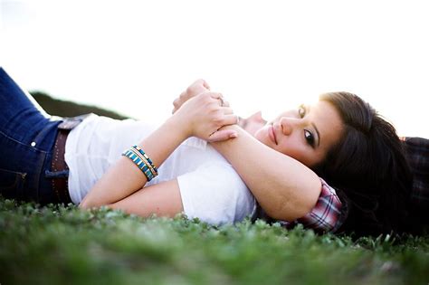 i want a picture like this: her holding his arm laying on his chest in ...