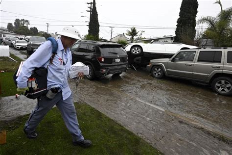 Flash floods inundate homes and overturn cars in San Diego as heavy ...