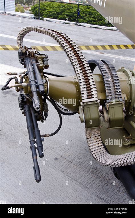 Machine gun mounted on a us navy helicopter Stock Photo - Alamy