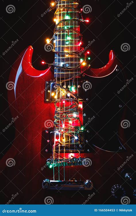 Electric Guitar with Festive Christmas Lights Stock Image - Image of ...