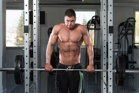 Trapezius Workout with Barbell Stock Image - Image of body, bodybuilder: 62870017