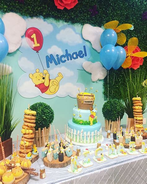 Winnie the Pooh theme at @adamsgardenla with outdoor space! Happy 1st Birthday Michael! #ada ...