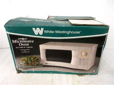 White Westinghouse 600W microwave oven, new - Albrecht Auction Service