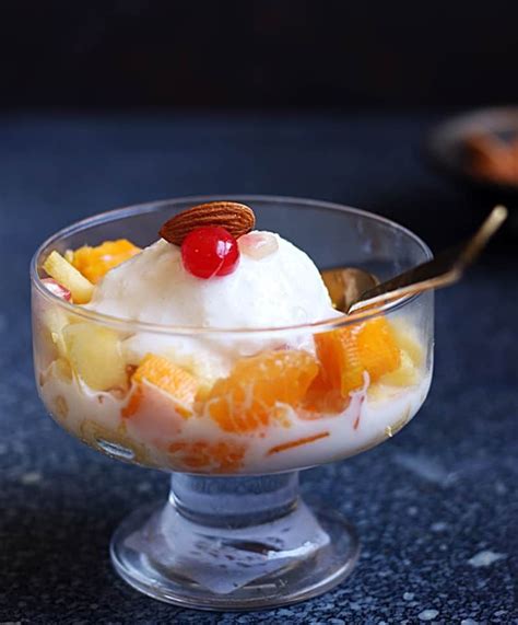 Easy fruit salad with ice cream recipe via cookclickndevour.com # ...