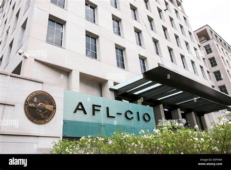 A logo sign outside of the headquarters of the American Federation of ...