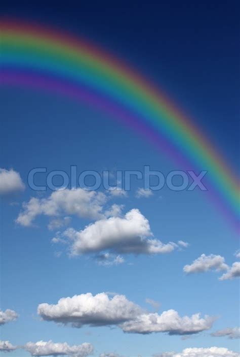 Rainbow in the sky with clouds | Stock Photo | Colourbox