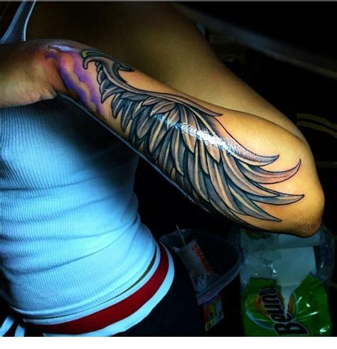 Incredible arm tattoo - Miladies.net | Wing tattoos on back, Forarm tattoos, Angel wings tattoo