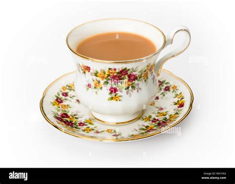 Tea served in a traditional English cup and saucer Stock Photo - Alamy