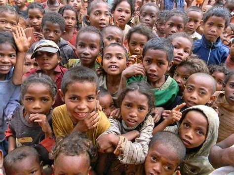 Being greeted by Malagasy village children in the Bongolava region of ...