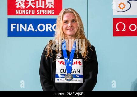 Claire Curzan of United States of America shows the gold medal after ...