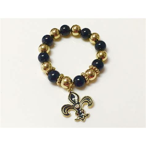 Fleur de Lis Bracelet | Products | Beaded bracelets, Stretch bracelets, Bracelets