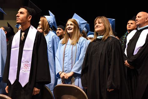 Vista Ridge High School graduates prepare for a commencement ceremony ...