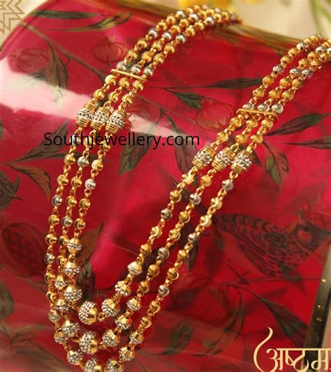 22 Carat gold three line gold balls mala by Manubhai Jewellers. gundu mala designs, gundla ...